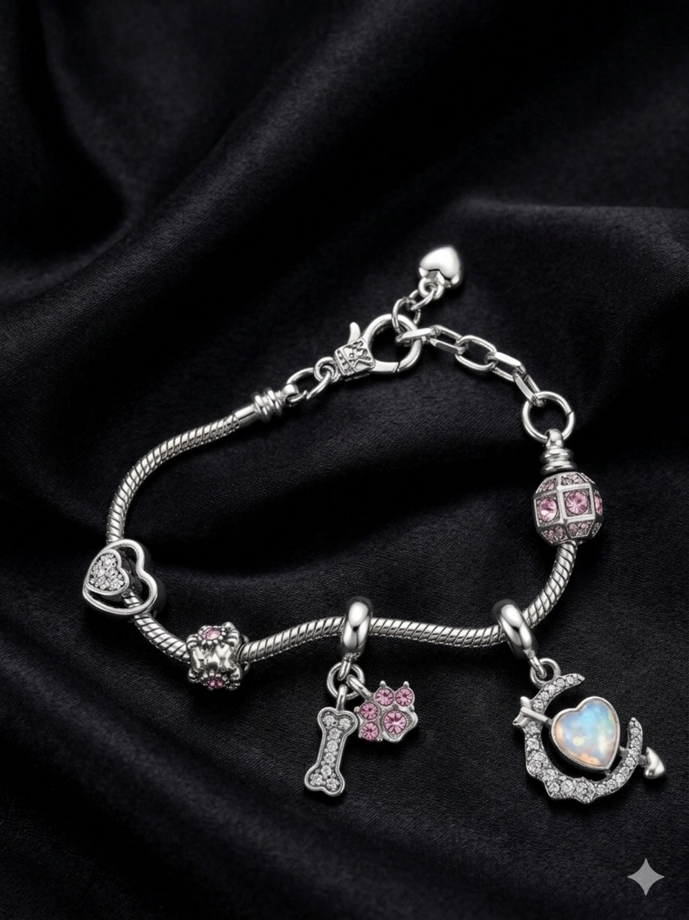 Silver Charm Bracelet with Pink Accents and Heart Pendant